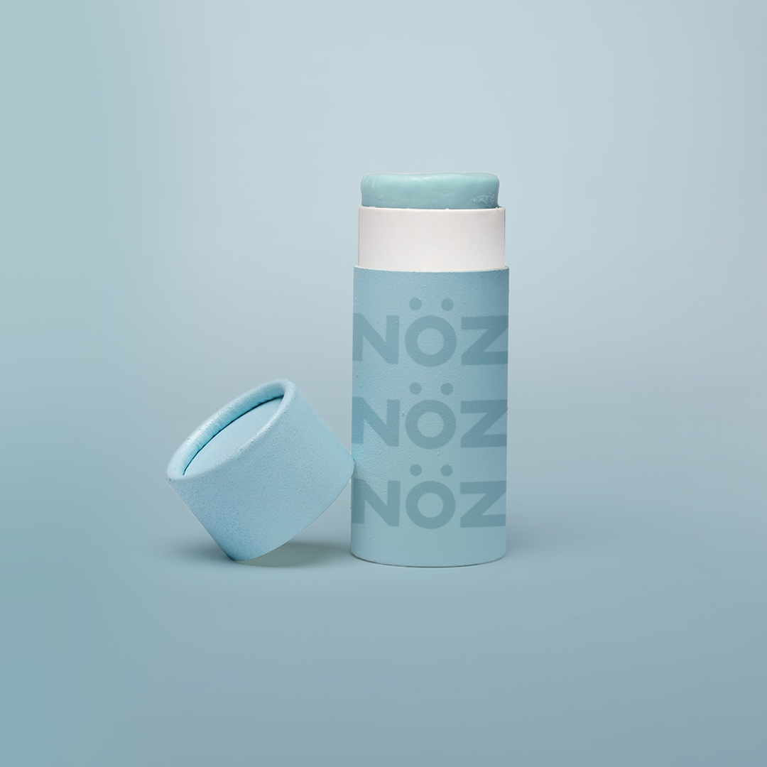 Blue color zinc NOZ brand sunscreen stick.