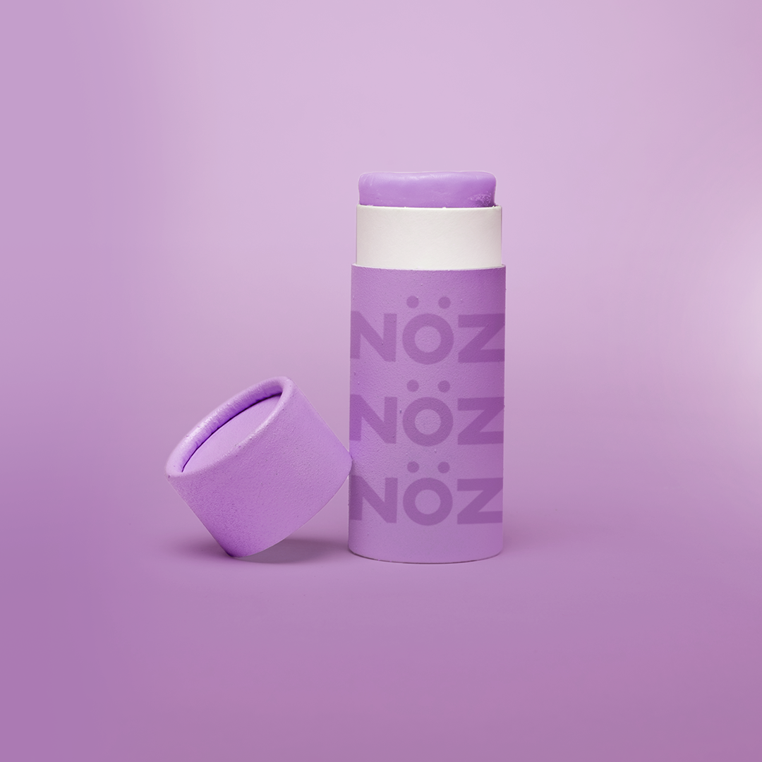 Purple color zinc NOZ brand sunscreen stick.