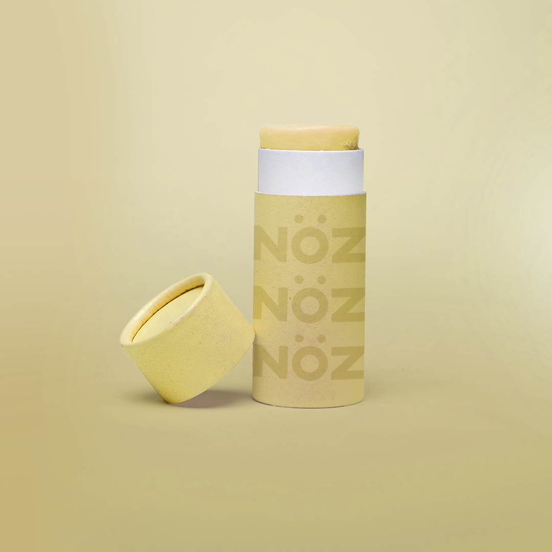 Yellow color zinc NOZ brand sunscreen stick.